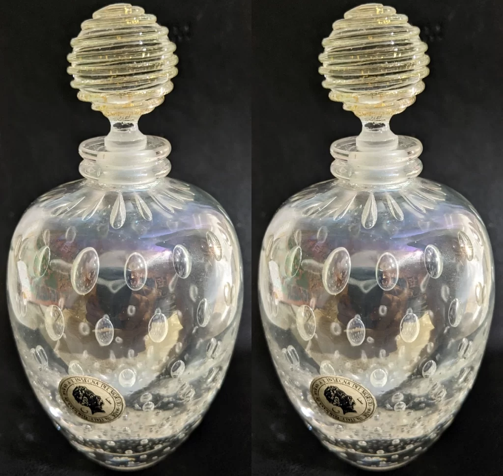 Galliano Ferro labeled perfume bottles with 24k gold-dusted stoppers handmade in Murano Italy